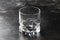 Empty glass for whiskey, brandy or bubon, old fashion type, copy space, selective focus