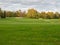 Empty golf course on a cloudy autumn day. Colorful autumn leaves lying on the German golf course in Heiligenhaus in NRW.