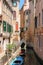 Empty gondola on canal of Venice