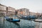 Empty gondolas moored on Grand Canal in Venice, Italy.