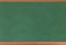 Empty green chalkboard texture hang on the white wall. double frame from greenboard and white background.