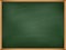 Empty green chalkboard with wooden frame. Template