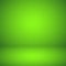 Empty green studio abstract background with spotlight effect. Product showcase backdrop. Chroma key compositing.