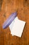 Empty Greeting or Invitation Card with Envelope and Purple Quill