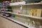 Empty grocery store shelves of toilet paper  before a hurricane or snow storm