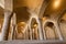 Empty hall of old Persian mosque Vakil with tall columns