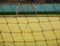 Empty handball gate. Outdoor football or handball playground, plastic light green surface on ground