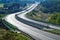 Empty highway between forests in the landscape