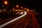 Empty highway with illuminated streetlights at night