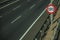 Empty highway with SPEED LIMIT signpost in Madrid