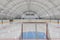 empty hockey field, arena with ice and markings and gates