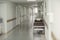 Empty hospital corridor with medical trolley