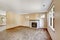 Empty house interior. Bright ivory living room with fireplace