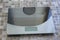 Empty household digital kitchen scale on table with oilcloth