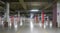 Empty Industrial Shed or Parking Lot. Urban, Rough Under-construction Background. Empty Warehouse Interior