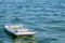 Empty inflatable mattress on the surface of the water