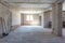 Empty interior in house without repair with white silicate brick walls