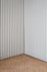 Empty interior scene of rattan display on gray corrugated background concept. Blank product shelf standing backdrop