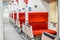 Empty interior of the train for long and short distance in train carriage with red seats with window view