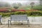 Empty iron seats with beautiful garden background