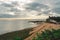 Empty Kingsgate Beach and Castle on the cliffs above the Bay, on cloudy autumn morning