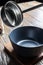 Empty ladle over an empty dish for borsch and soup, in a rustic style, close-up, shallow depth of field, selective focus