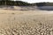 Empty lake at Bimont Dam in France