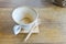 Empty latte coffee cup mug on wood table