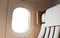 Empty Leather Chair Background Inside Interior First Class Airplane Private Jet. Blank White Illuminator Mockup Ready