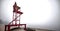 Empty lifeguard chair on the beach on a foggy morning.