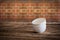 Empty little bowl on wooden tabletop