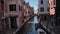 Empty little canal in Venice