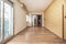 Empty living room with chestnut wood floors and freshly painted