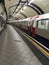 Empty London Underground station with train