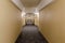 Empty and long hotel corridor