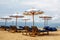Empty loungers without tourists on the beach