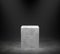 Empty marble podium on concrete floor with spotlight background. 3D rendering.