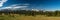 Empty Meadow Flanked By Pines Sits Under the High Sierras of Yosemite