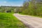 Empty meandering road through small village Petro-Svistunovo in central Ukraine