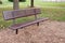 Empty metal park bench