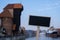 Empty mockup template Blackboard label against Gdansk beautiful old town over Motlawa river. The Zuraw Crane and