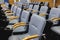 Empty modern conference hall, venue for congress lecture, line row of chairs, auditorium for convention and press conference event