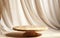 Empty modern round wooden podium side table in soft white blowing drapery curtain drapes in sunlight for luxury cosmetic skincare