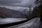 Empty moody road at Ullswater lake