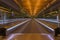 Empty moving walkway in International airport Doha, Qatar. Moving sidewalk in perspective. Airport interior. Travel in quarantine.