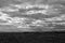 Empty mysterious mountainous landscape from the center of the Canary Island Spanish Fuerteventura with a cloudy sky