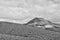 Empty mysterious mountainous landscape from the center of the Canary Island Spanish Fuerteventura with a cloudy sky