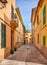 Empty narrow street in Alcudia old town, Mallorca