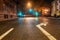 Empty night road with traffic lights