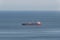 Empty oil tanker alone in the middle of calm ocean